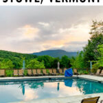 Stowe, Vermont poolside with a view of the mountains.