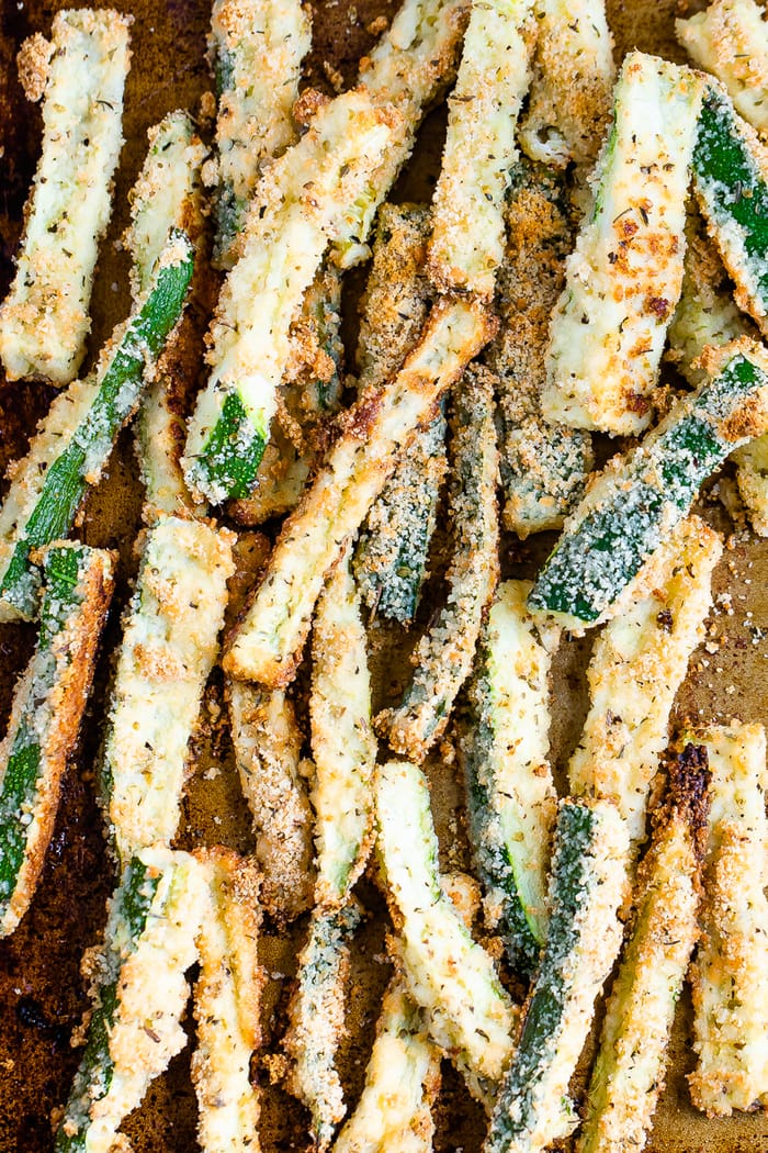 Sheet pan with crispy baked zucchini fries.