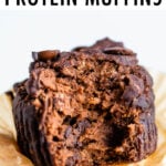 Double chocolate protein muffin with a bite taken out of it.