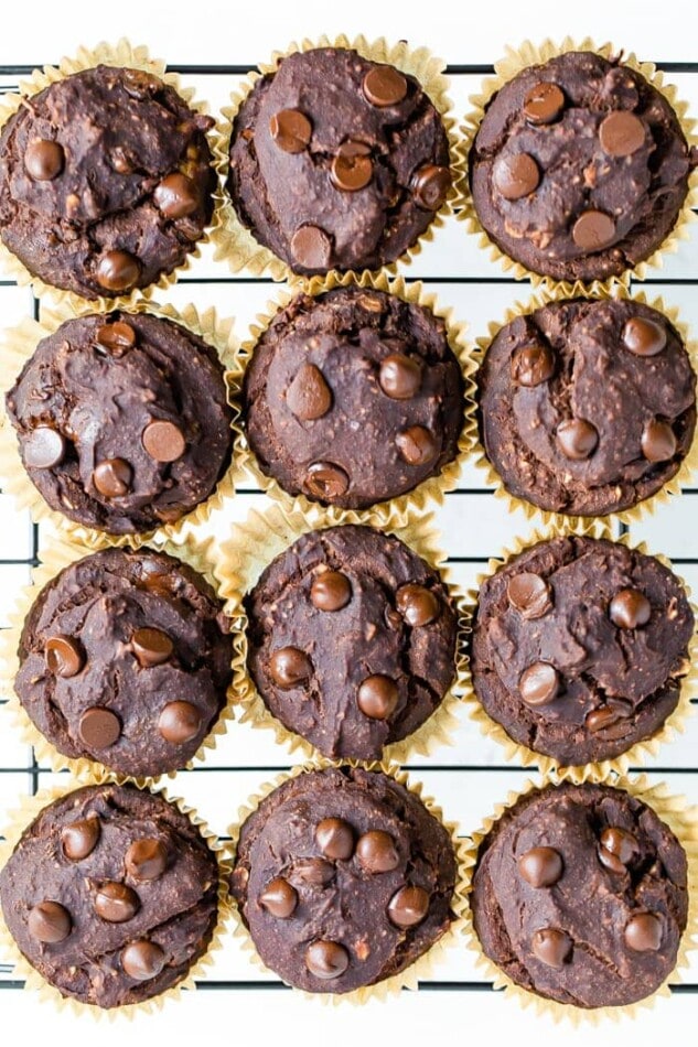 Double chocolate protein muffins on a cooling rack.