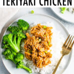 Plate with rice, broccoli, and slow cooker teriyaki chicken. A gold fork is resting on the plate.