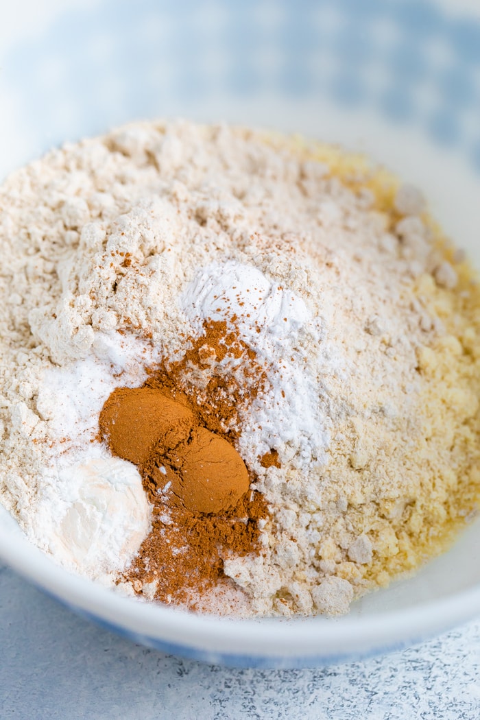 Mixing bowl with dry ingredients to make almond flour and oat flour snickerdoodles.