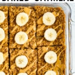 Square baking dish with peanut butter banana baked oatmeal with a slice taken out of it.