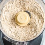 Food processor with blended oats that are now oat flour.