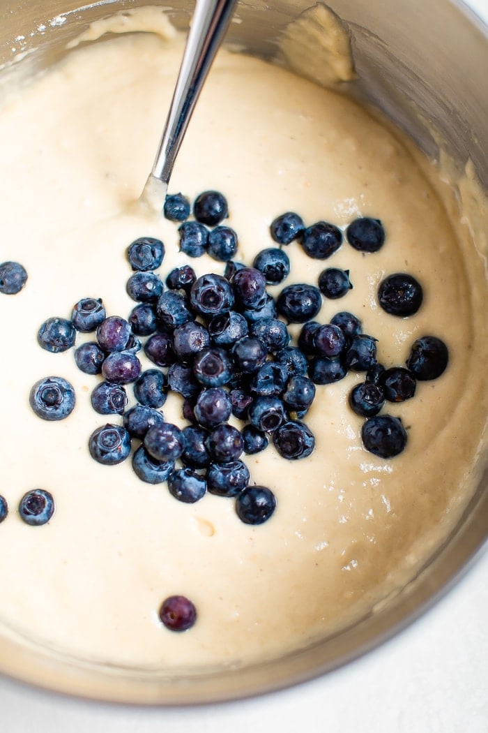 Blueberry muffin batter in a bowl.