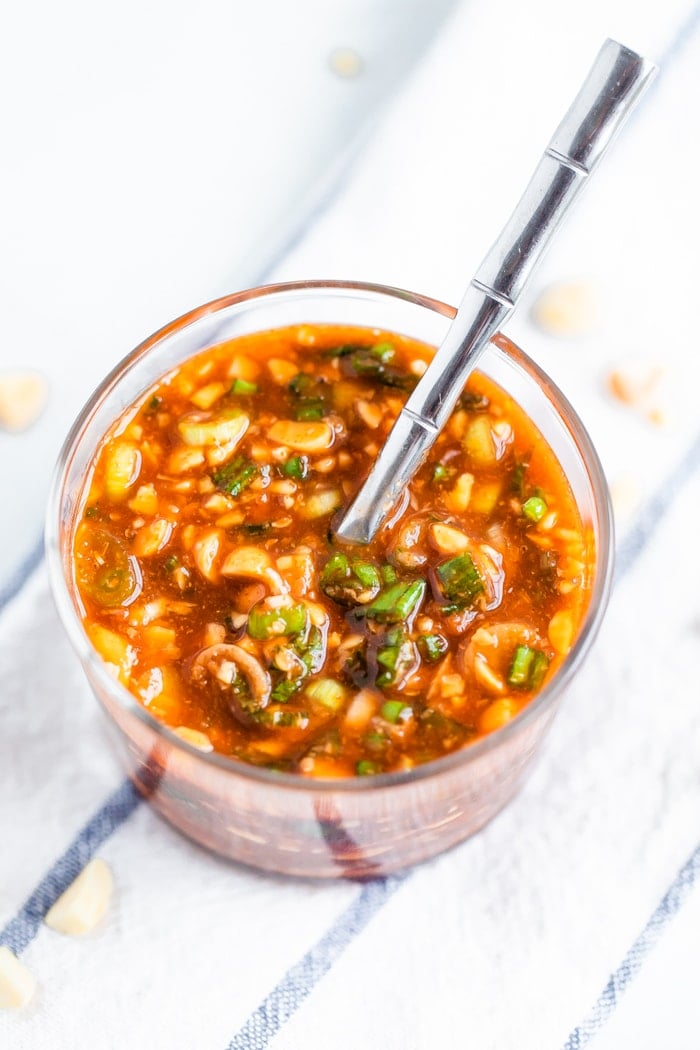 Sweet and spicy sriracha sauce in a jar.