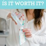 Woman pouring breast milk from a pump into a milk bag.