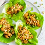 Four leaves of lettuce with a ground chicken Asian filling.