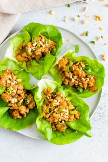 Four leaves of lettuce with a ground chicken Asian filling.