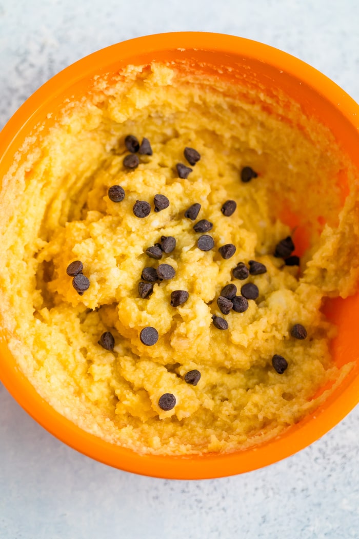 Mixing bowl with the batter for a coconut flour chocolate chip mug cake.