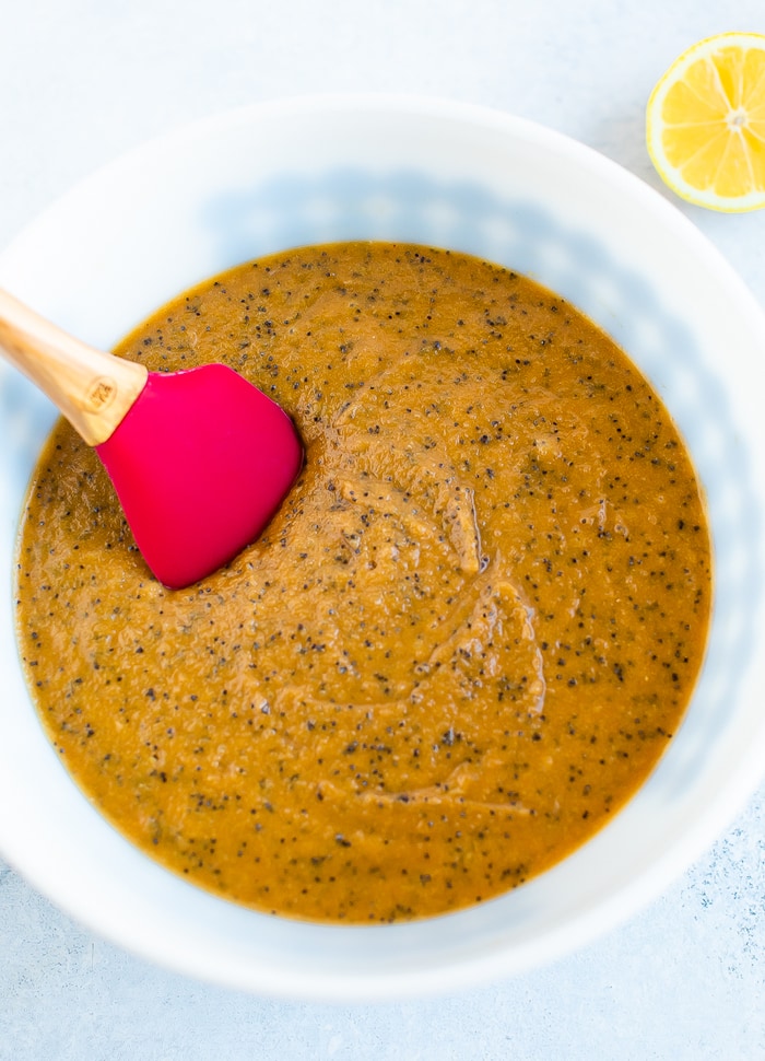 Mixing bowl with lemon poppyseed muffin batter.