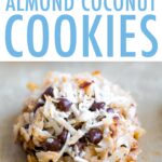 Close up of a almond coconut chocolate chip cookie on a cookie sheet.