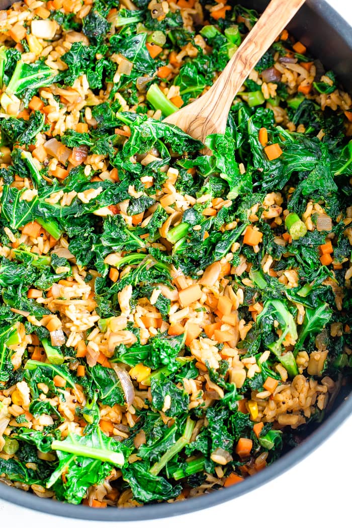 Skillet with Spanish rice, kale, veggies and mushrooms.