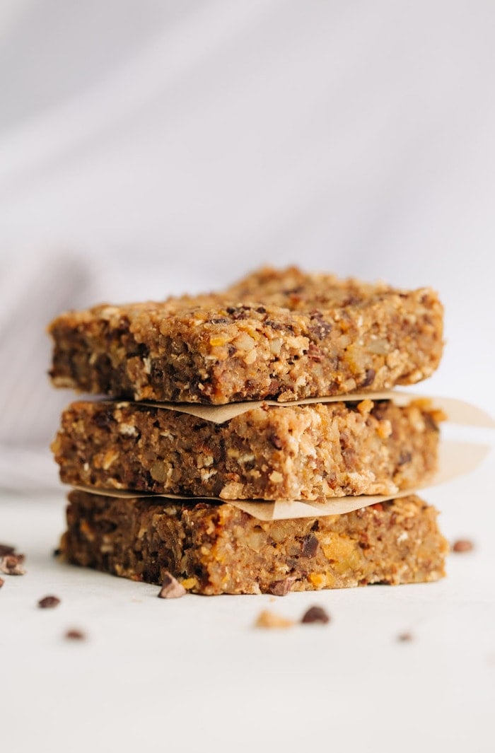 Stack of three fruit and nut bars.