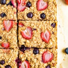 Berry oatmeal bars cut into squares.