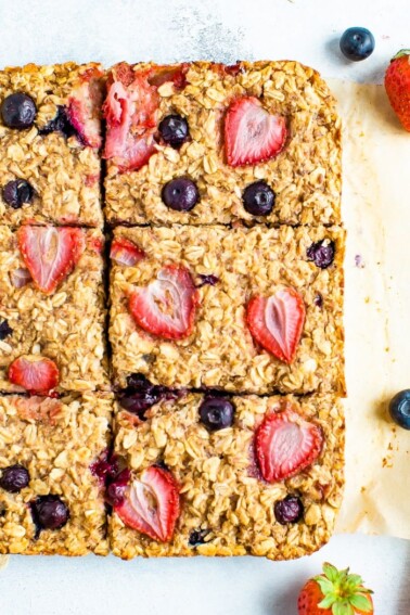 Berry oatmeal bars cut into squares.
