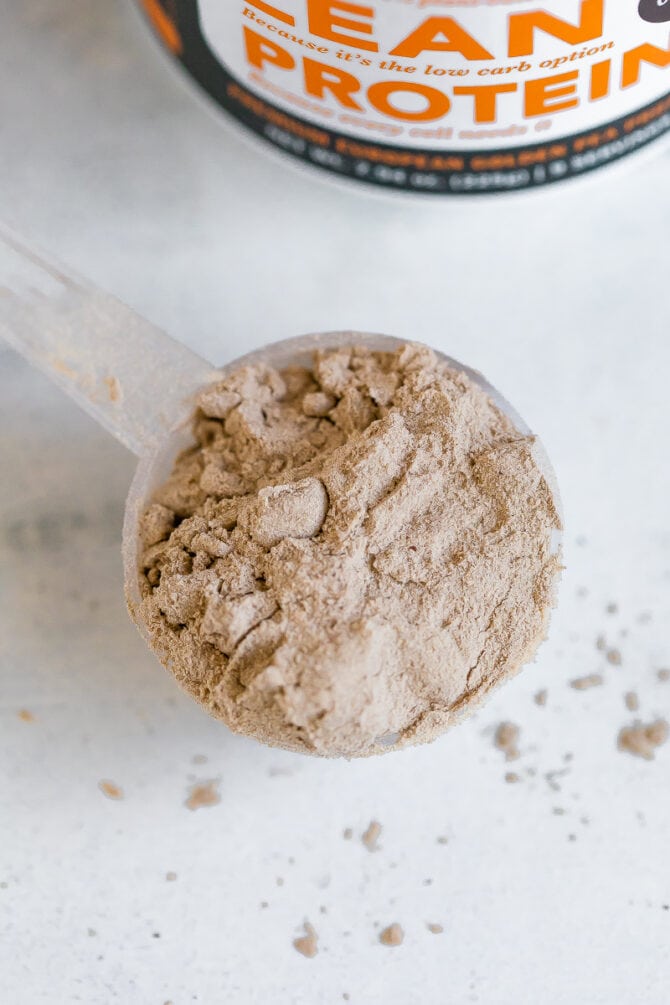 Scoop of chocolate protein powder