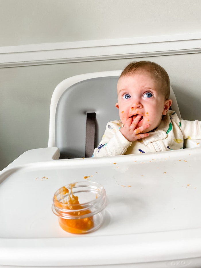 Baby having sweet potato for the first time.