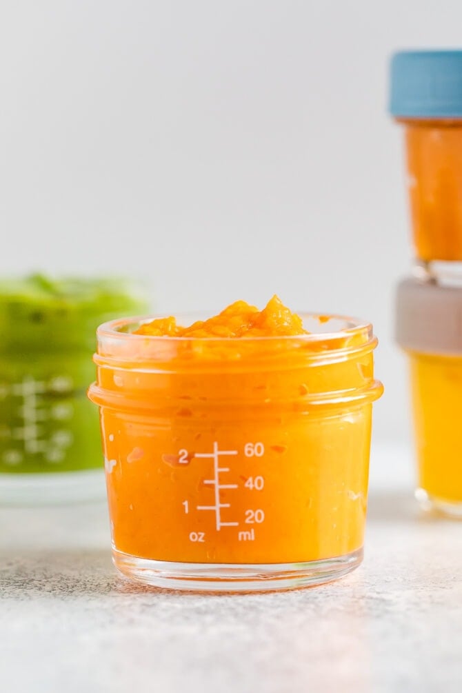 Sweet potato puree for baby in a small 4 oz glass jar