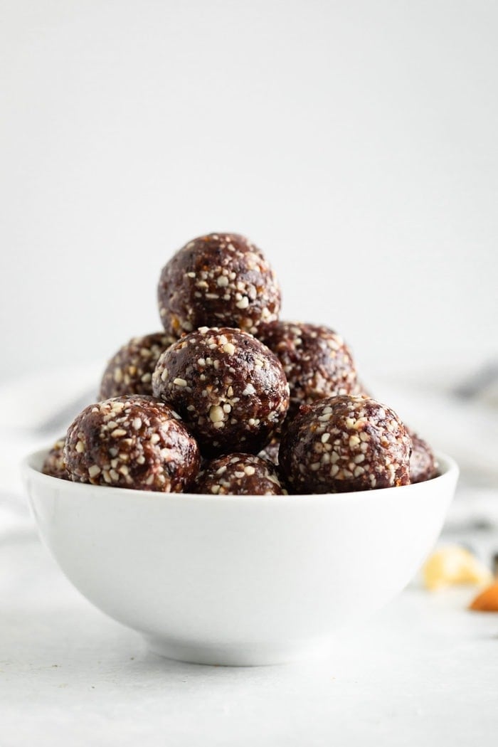 Bowl of blueberry energy balls.