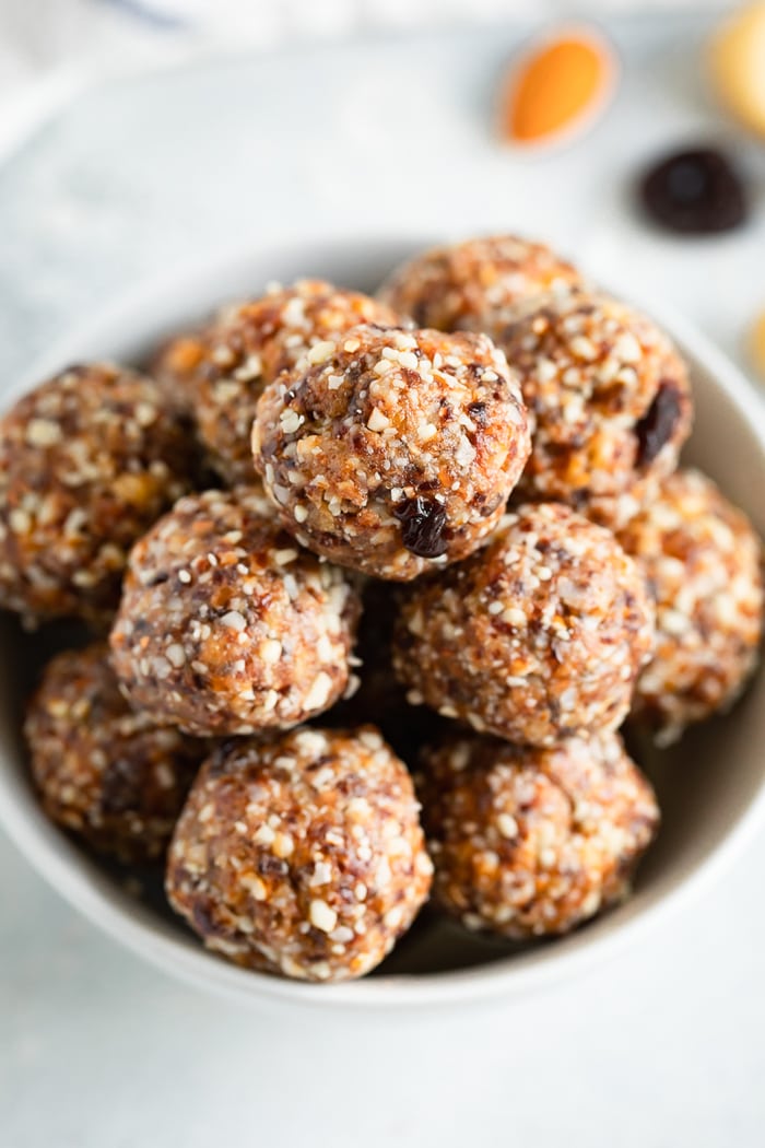 Bowl full of cherry pie energy balls.