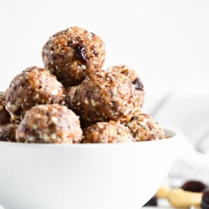 Cherry energy bites in a white bowl.