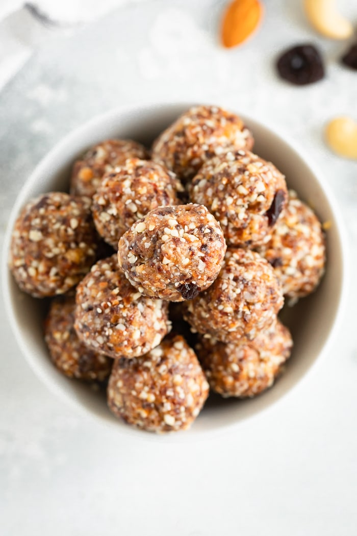 Bowl full of cherry pie energy balls.