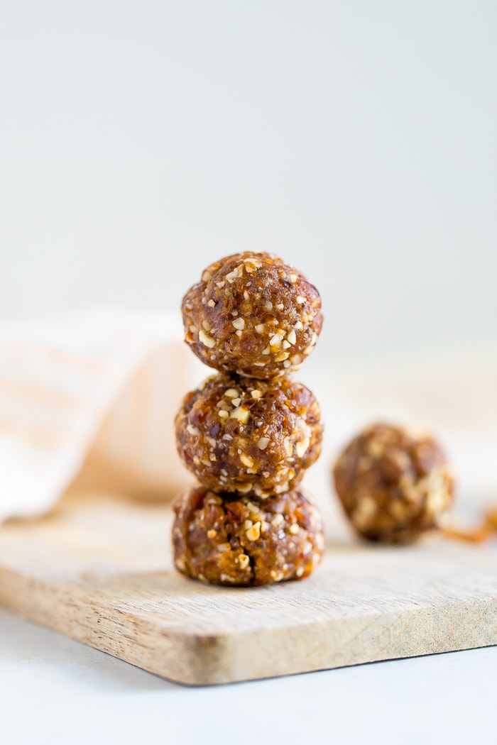 Stack of three pumpkin pie energy balls.