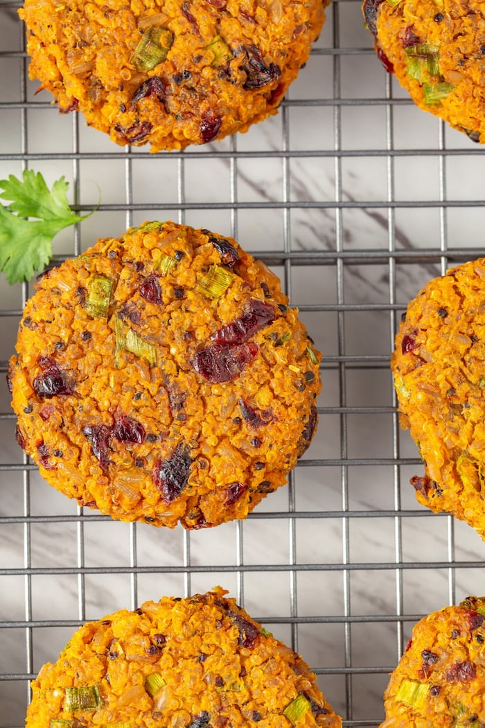 Sweet potato quinoa cakes on a wire rack, close up shot.