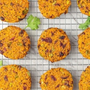 Sweet potato quinoa cakes on a wire rack.