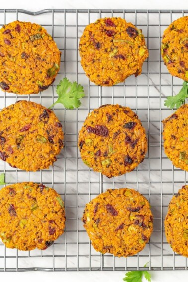 Sweet potato quinoa cakes on a wire rack.