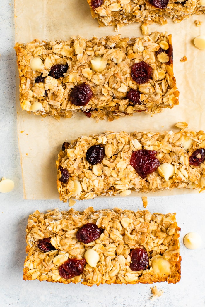 Cranberry granola bars on parchment.