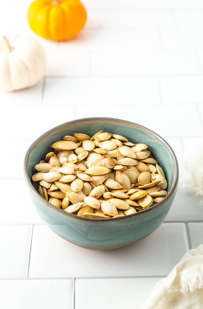 Bowl of roasted pumpkin seeds.