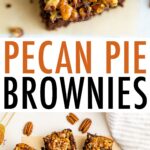 Pecan pie brownies on parchment paper surrounded by pecans.