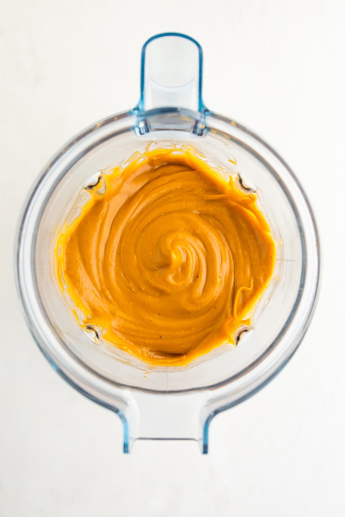 Blender with sweet potato pie mixture.