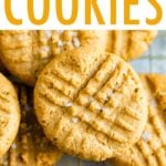 Peanut butter cookies on a cooling rack.