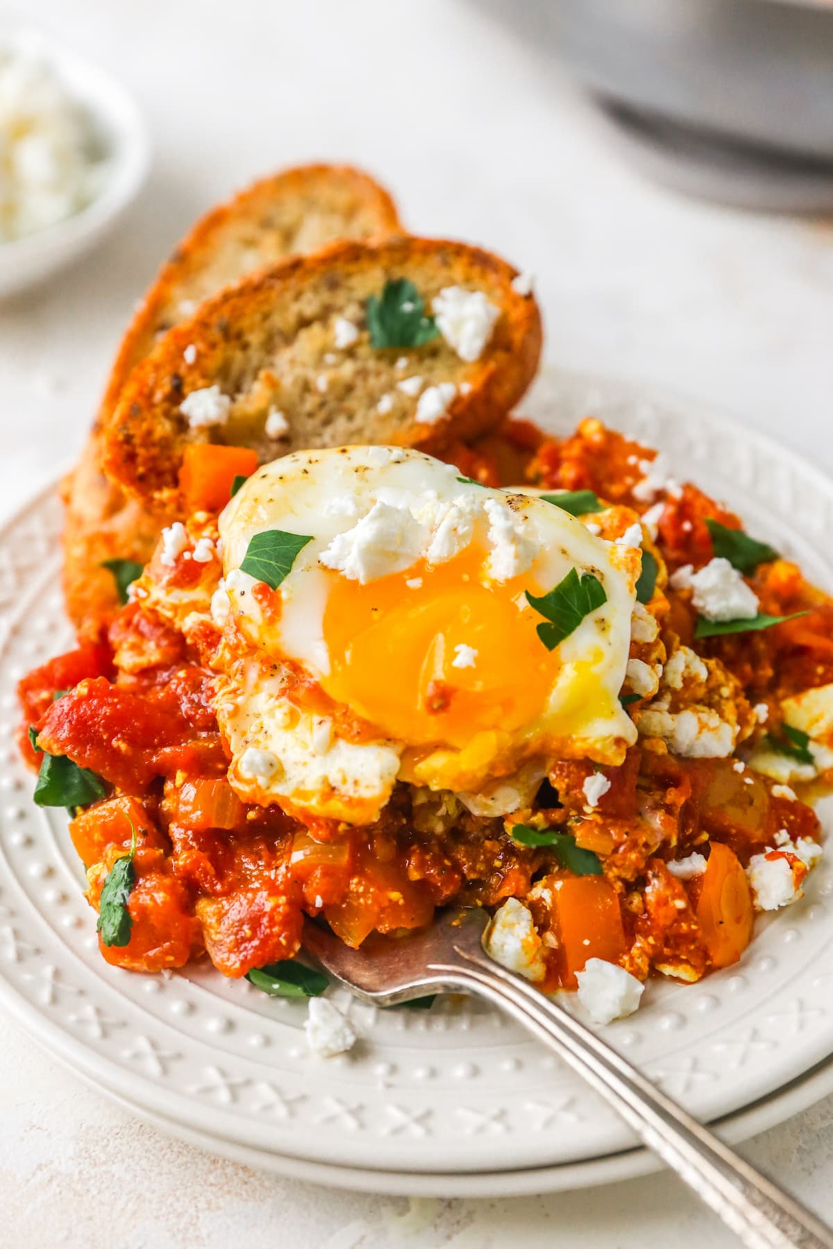 Plated shakshuka with a runny yolk.