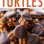 Close up photo of homemade turtle candies made with pecans, date caramel and chocolate.