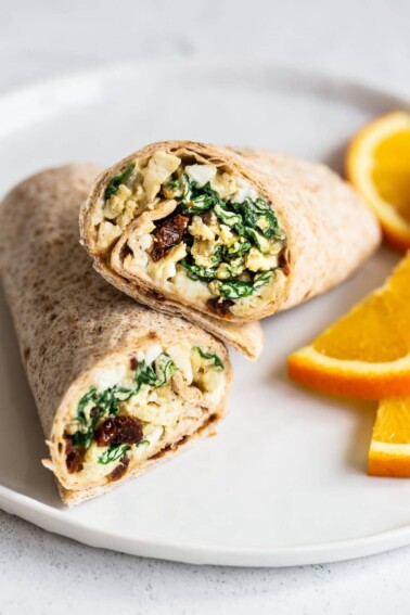 Wrap with eggs, spinach, sun-dried tomatoes and hummus.