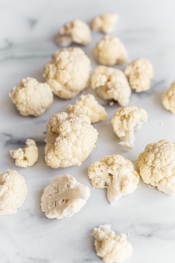 Cauliflower on a marble countertop.