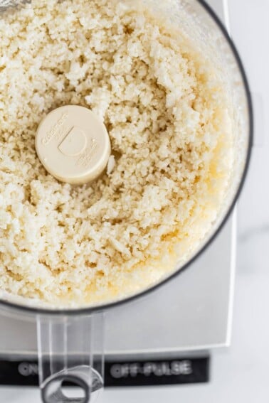 Blended cauliflower in a food processor.
