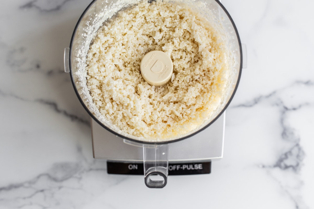 Blended cauliflower in a food processor.