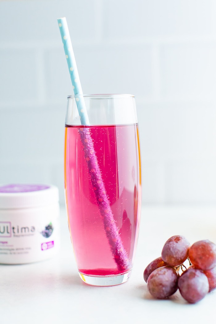 Glass of grape electrolyte soda.