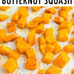 Roasted butternut squash on a sheet pan.
