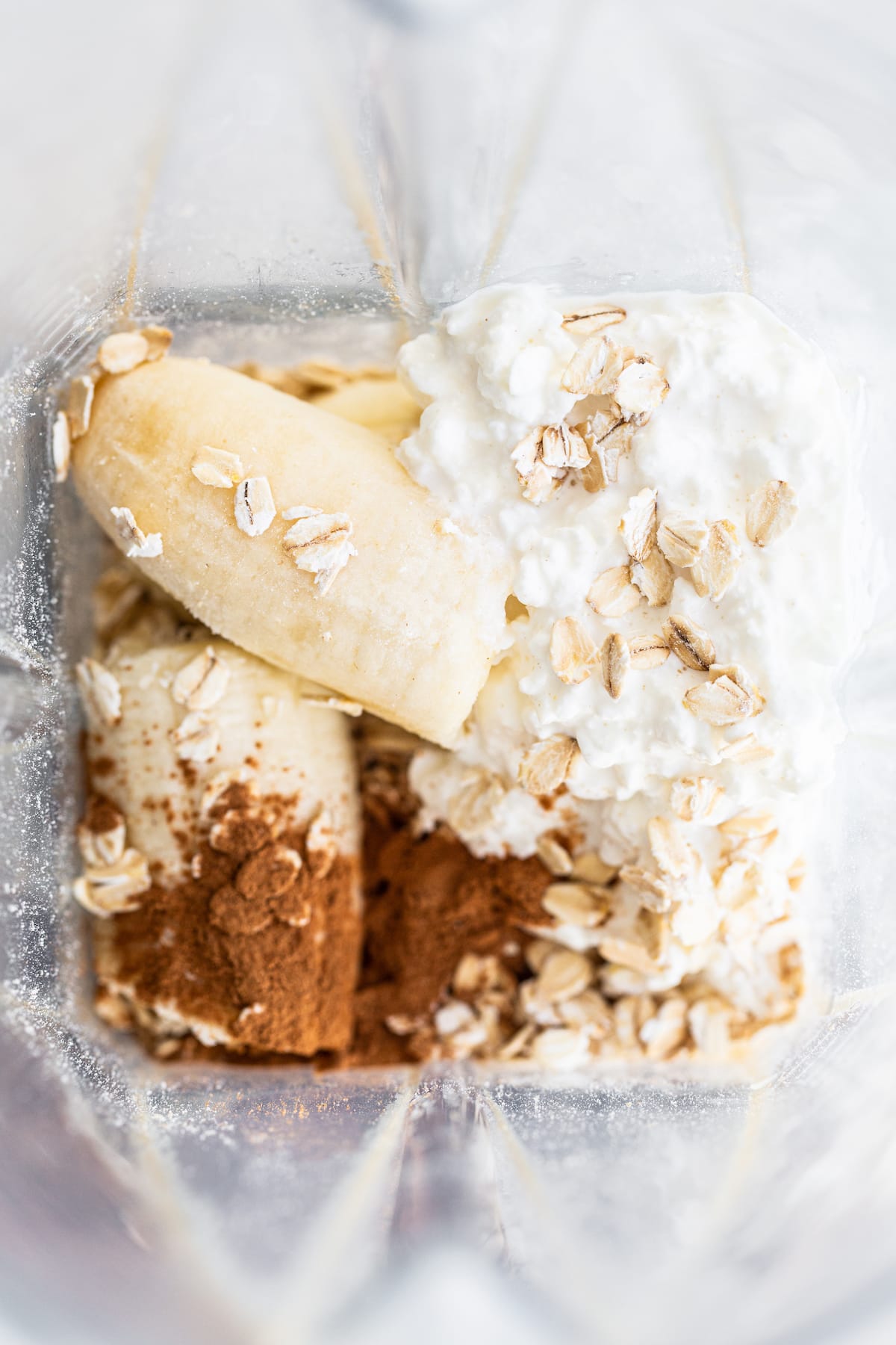 Cinnamon, banana, cottage cheese and oats in a blender.