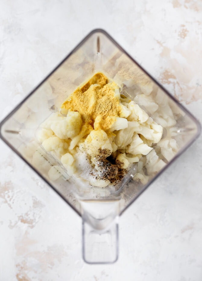 Cauliflower and spices in a blender.