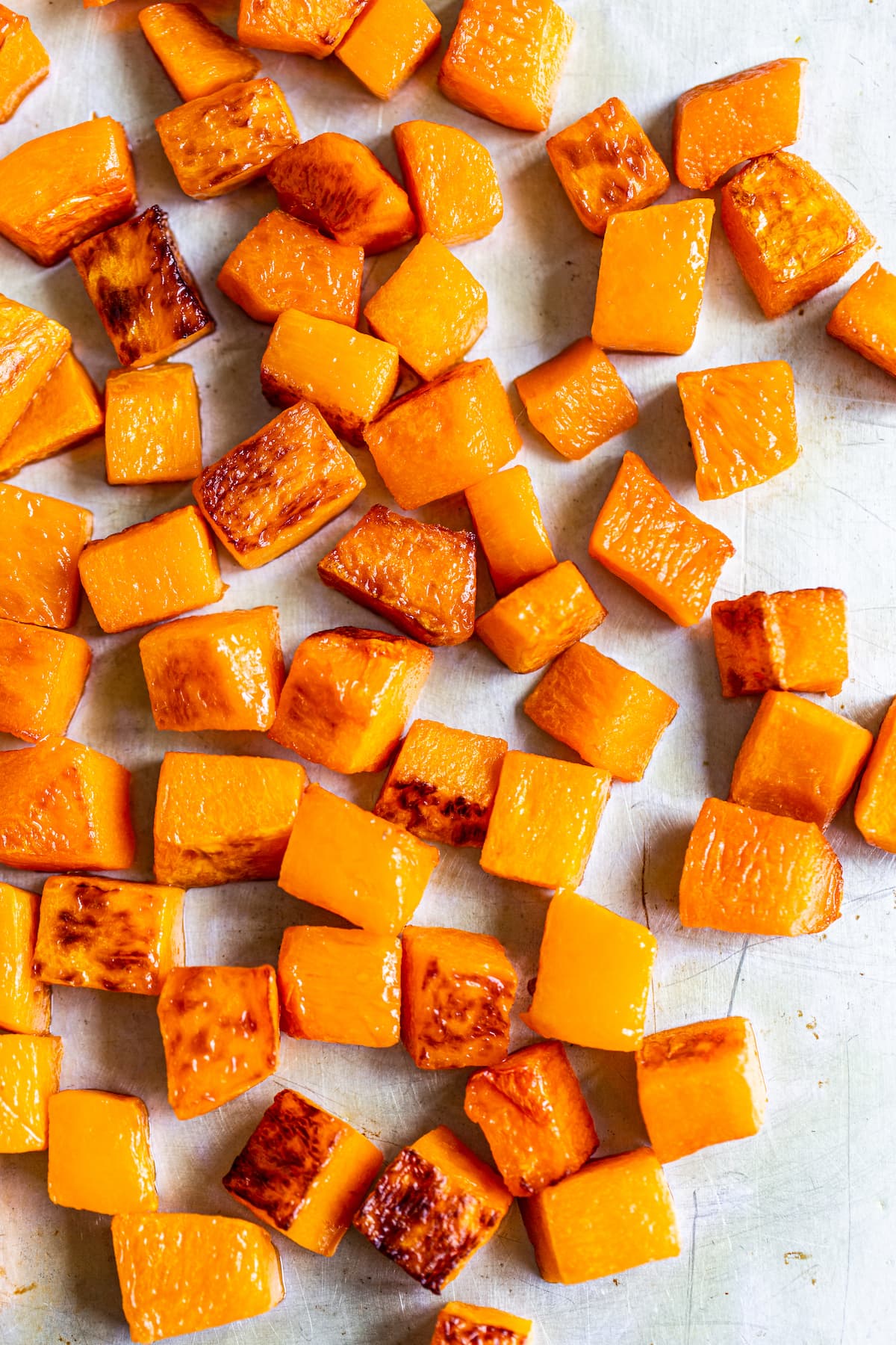 Roasted butternut squash on baking sheet. 