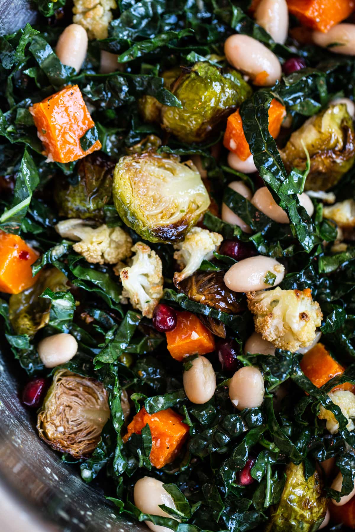 Kale salad with roasted vegetables and beans.