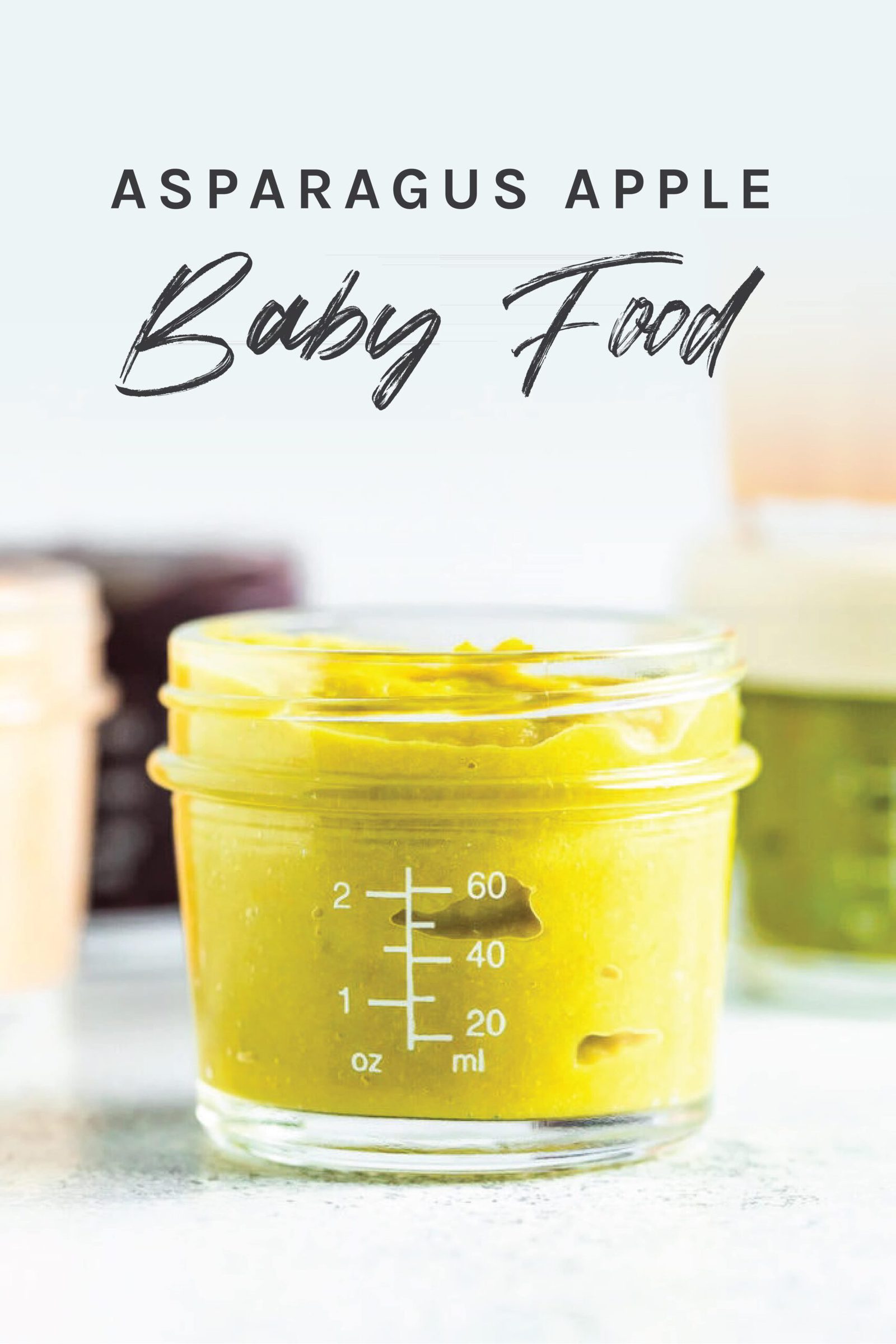 Jar of homemade asparagus apple baby food.