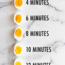 Five halves of hard boiled eggs with labels of how long the egg has been cooked for, from 4 minutes - 12 minutes.